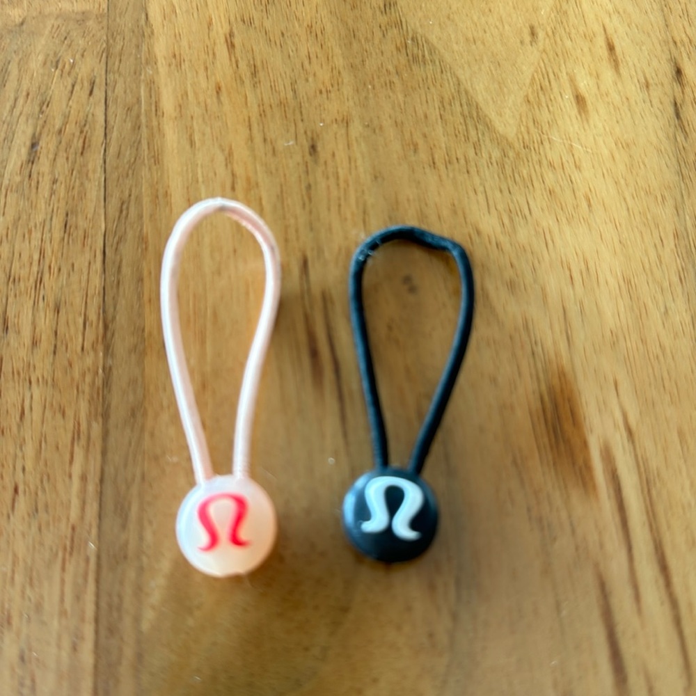 Lululemon zipper pulls/hair ties